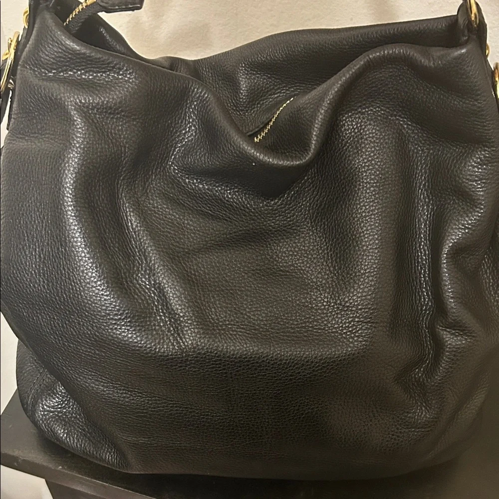 Michael Kors Black Hobo Bag with Gold Accents